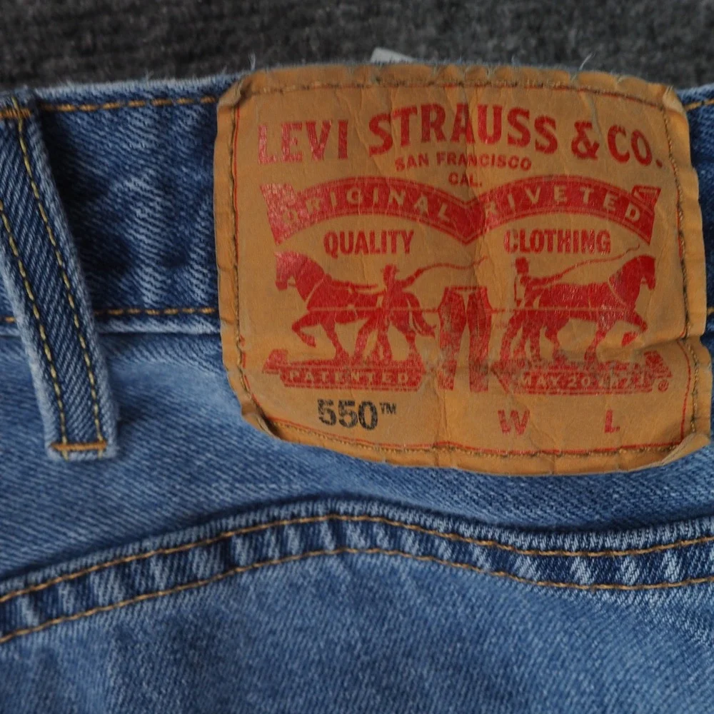 Levi's 550 Jeans Mens 48x29 Relaxed Fit Blue Solid Denim Casual Workwear Classic